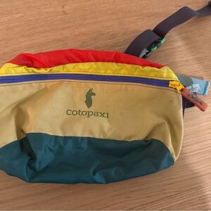 Cotopaxi Colorful Belt Bag with Red, Yellow, and Green